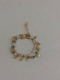 Blue Zircon and Gold Shell Bracelet hypoallergenic jewelry| LetheLoom Jewelry